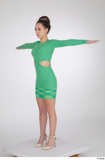 Jessie Clark casual dressed green long sleeve dress standing t-pose…